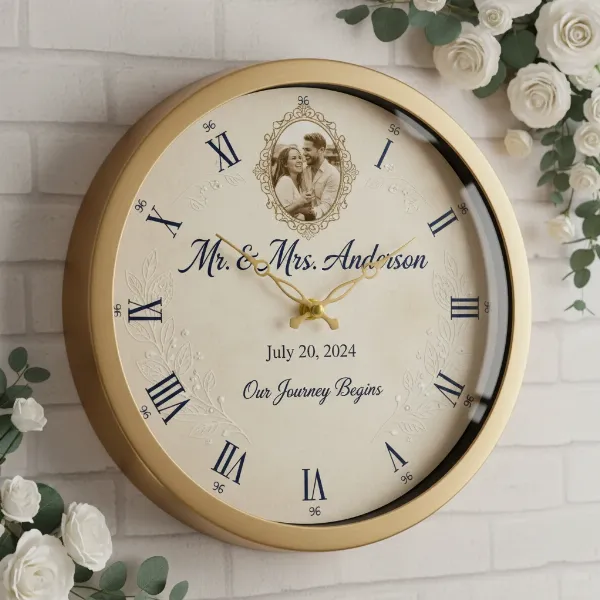 Close-up of a personalized wedding wall clock with engraved names, date, and a photo
