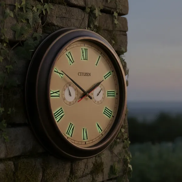 Outdoor wall clock showing integrated thermometer, hygrometer, and glowing hands.