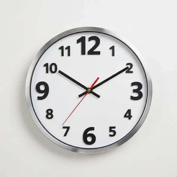 A Plumeet large number wall clock with bold 3D numbers on a clean white dial.