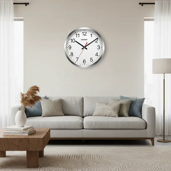 A Sharp atomic analog wall clock seamlessly integrated into a stylish living room decor.