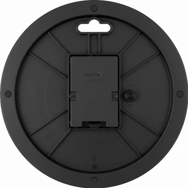 Close-up of Westclox clock back showing battery compartment, time setting dial, and hanging hook.